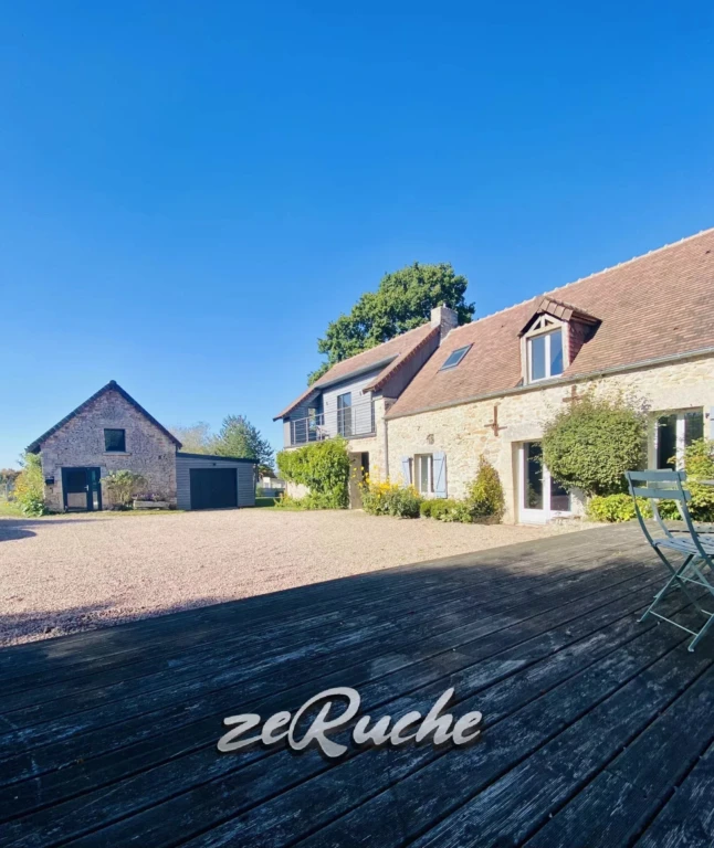 Belle maison avec jardin spacieux à vendre.