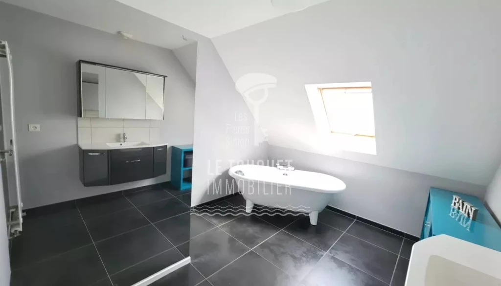 Salle de bain avec douche à l'italienne