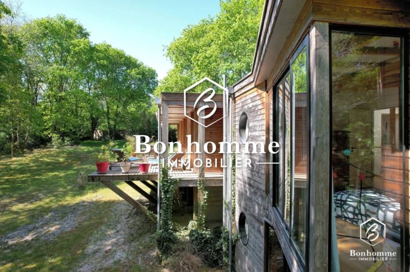 Maison à vendre : maison bois avec grand terrain boisé