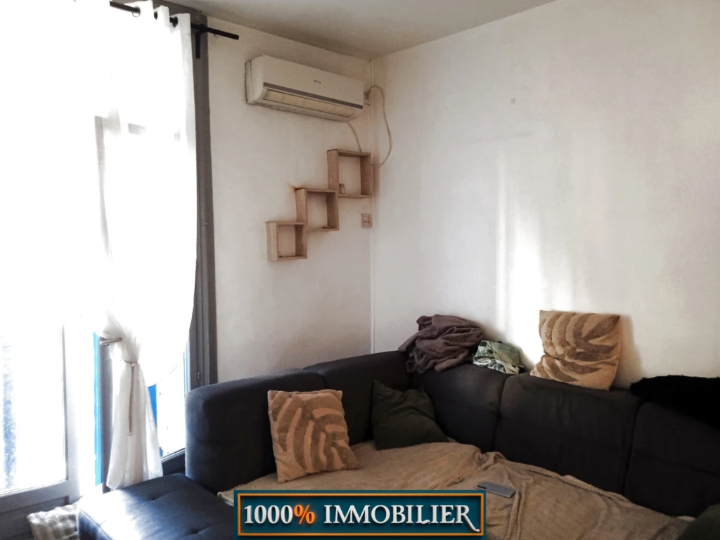 T3 1ER ETAGE COTE RUE