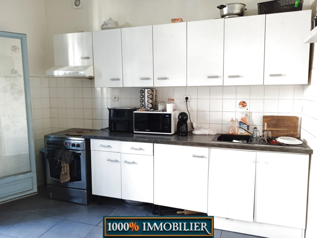T3 1ER ETAGE COTE RUE