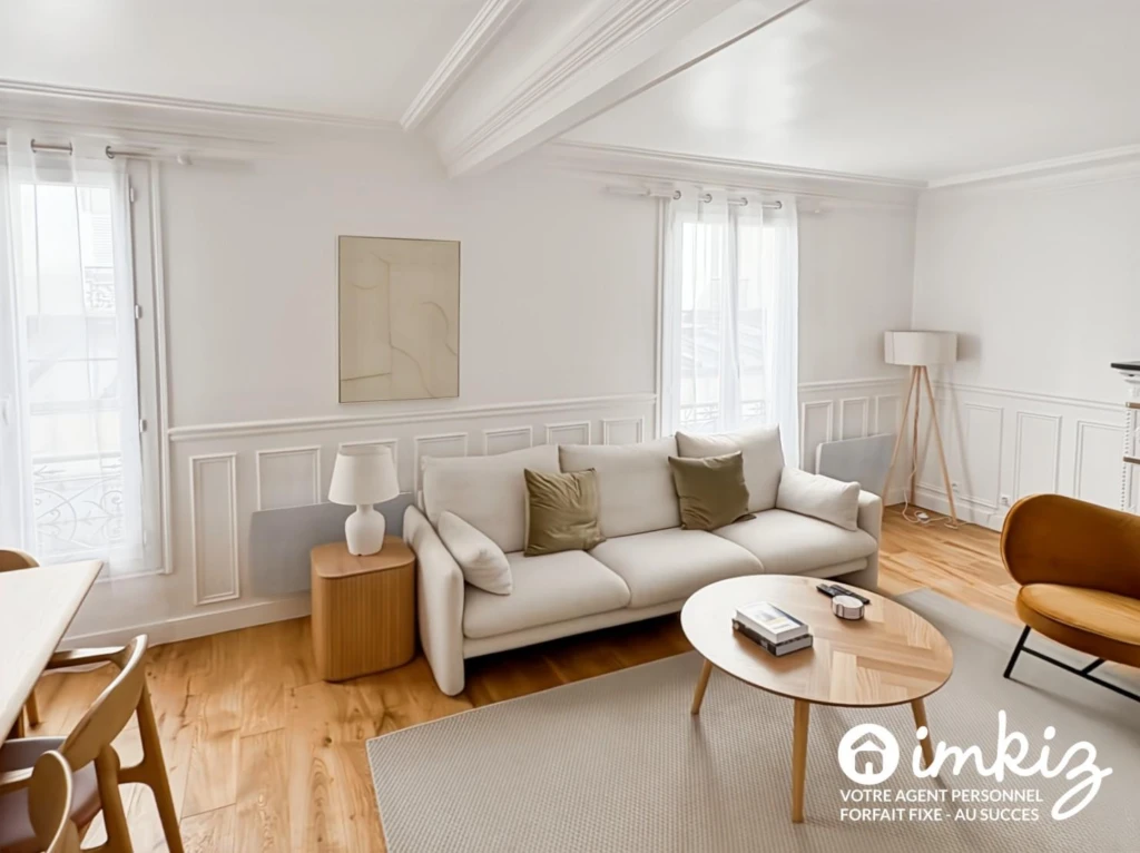 Paris 9e - 51 m² de caractère, parquet et cheminée 1