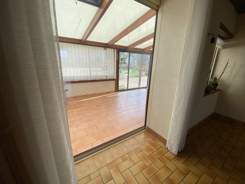 VERANDA VUE DU SEJOUR