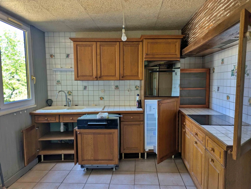 Maison avec cuisine aménagée et équipée
