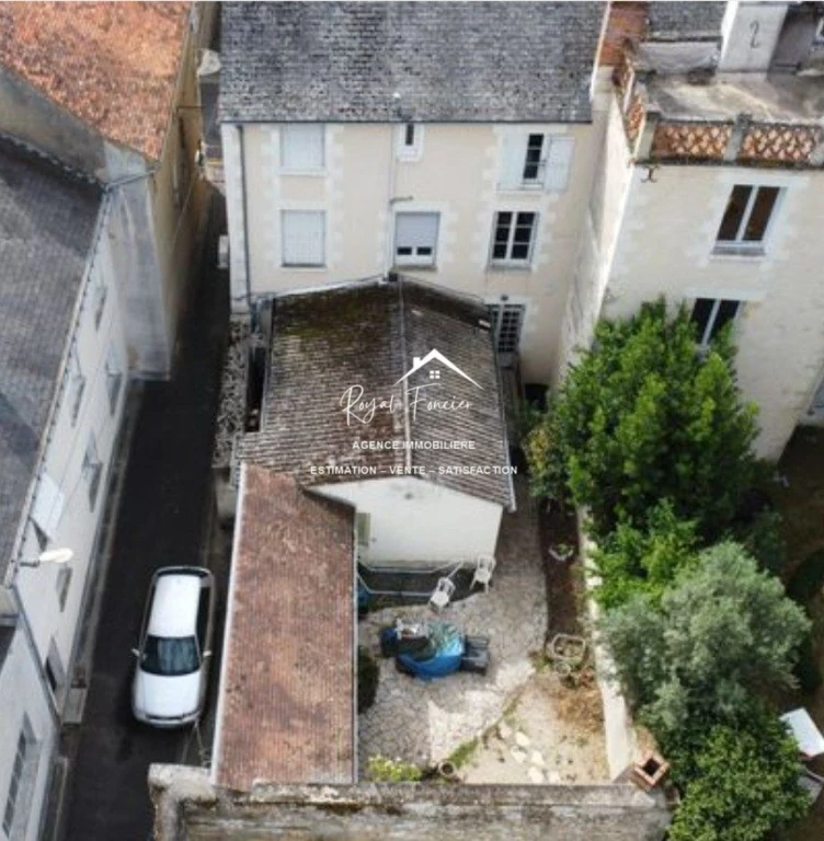 Immeuble avec local commercial + maison d'hab