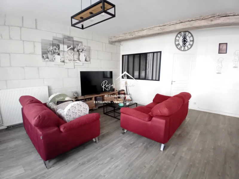 RDC : une belle pièce de vie de 70 m2 avec sa cuisine A et E