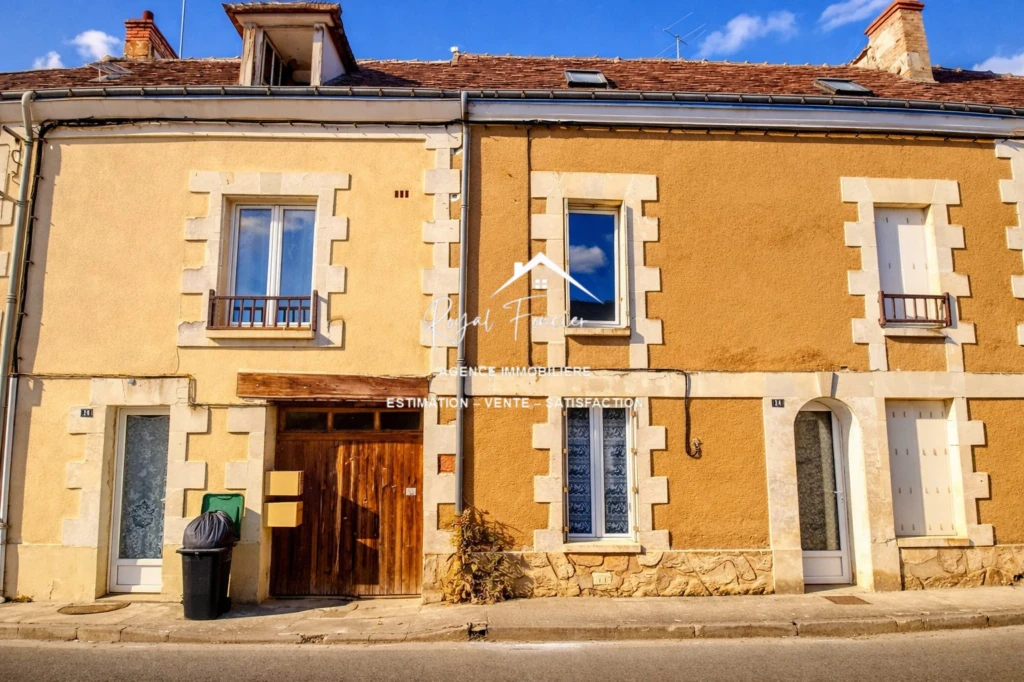 Immeuble de rapport avec 2 maisons louées