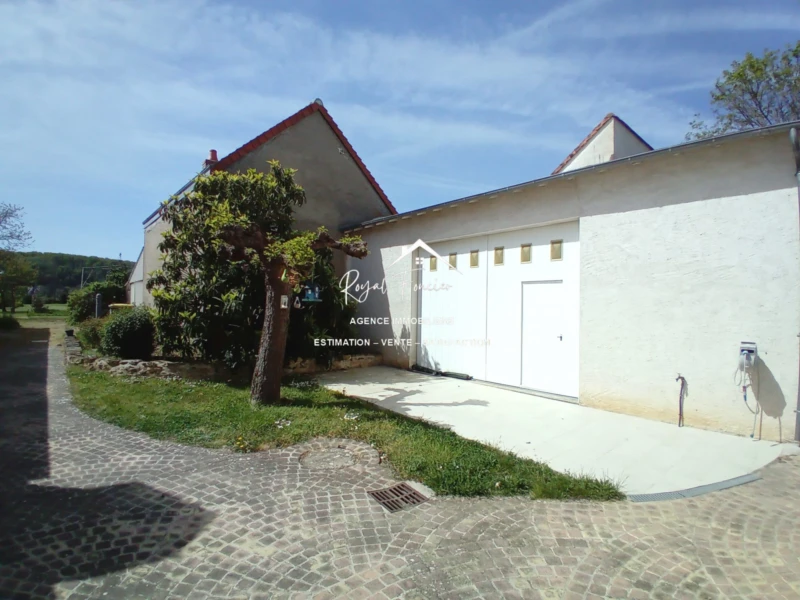 Garage et sa terrasse