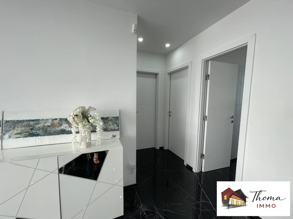 Salon et accès chambres