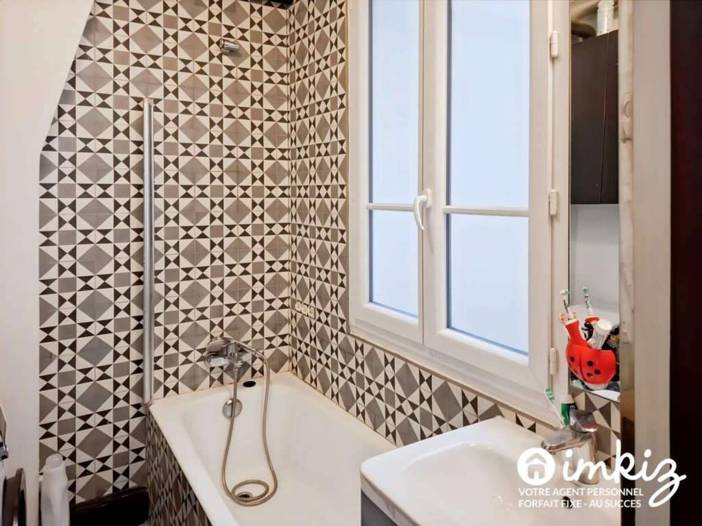 3P de 48,15 m² charme de l'ancien, calme sur cour 11