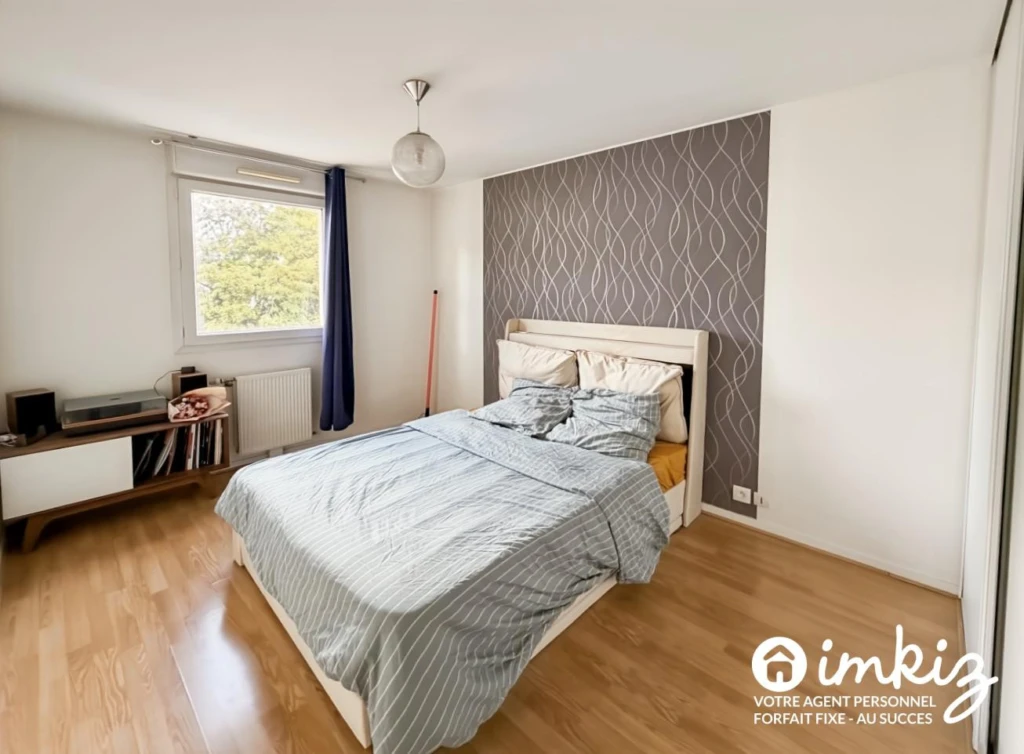 Appartement 3 pièces de 63m2, balcon, 2 parkings 5