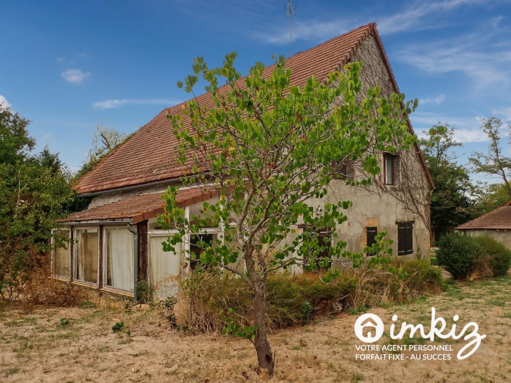 Maison 2 niveaux, grand terrain aménageable 1