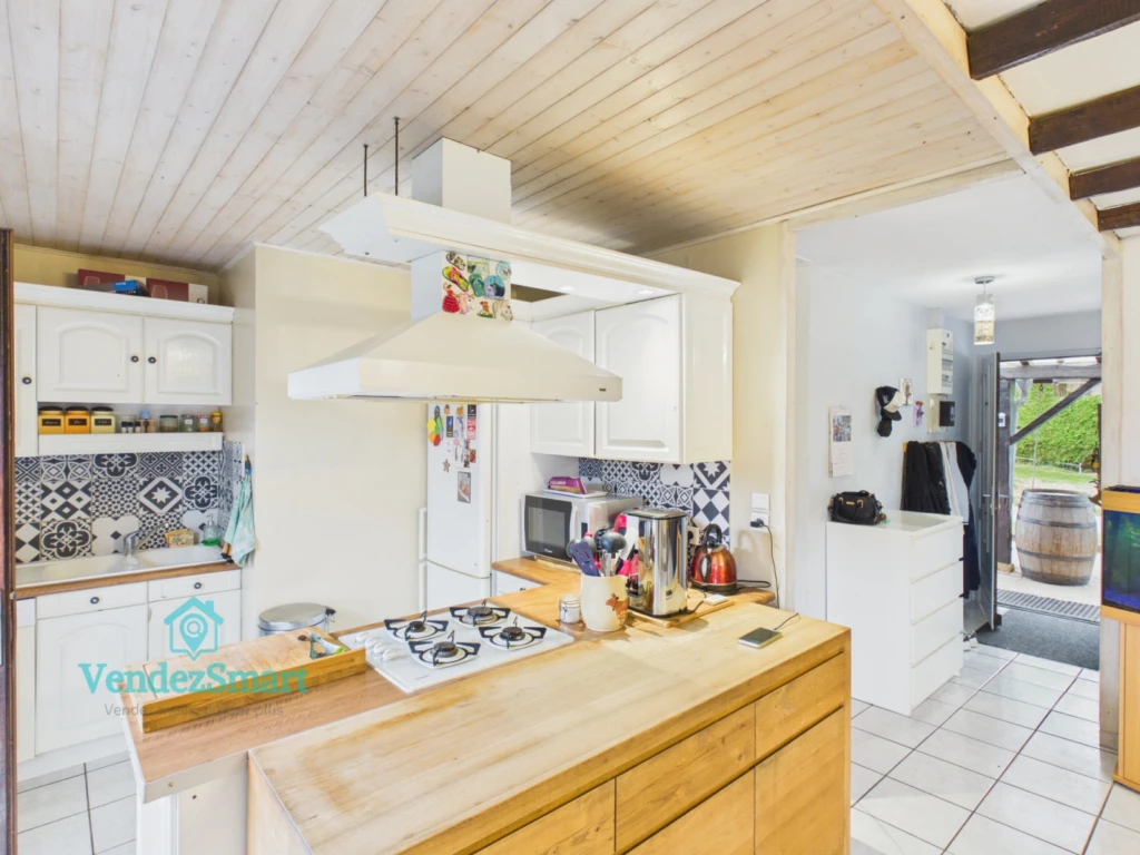 Maison de plein pied sur terrain de 1550m2 environ 3